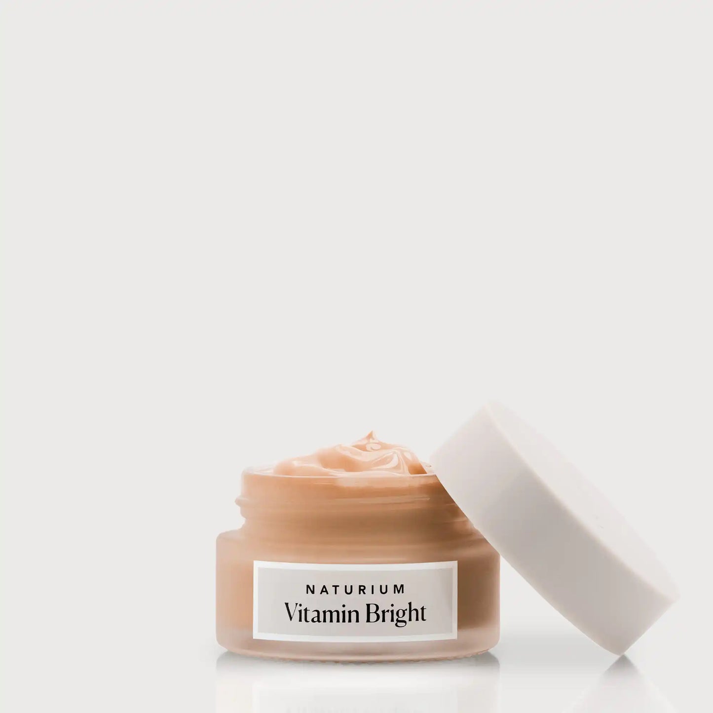 vitamin-bright-illuminating-eye-cream-b5 NATR-VitaminBright_DEEP_Primary_front_openjar_bone.webp