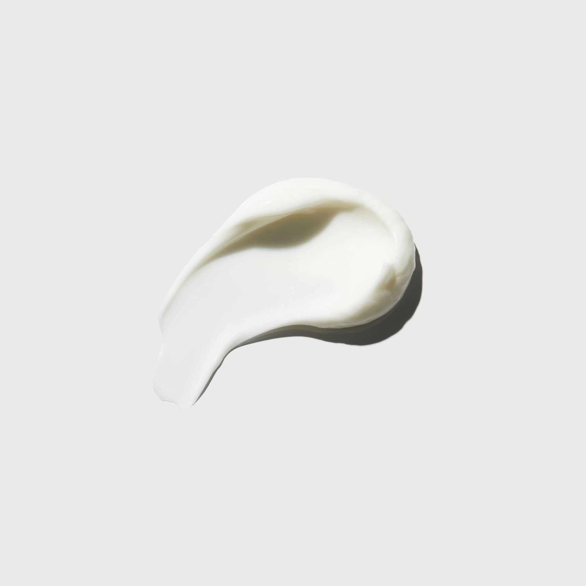 the-smoother-glycolic-acid-body-lotion-f1 NATR-40014-Swatch-The-Smoother-Glycolic-Acid-Body-Lotion-bonebkgd.jpg