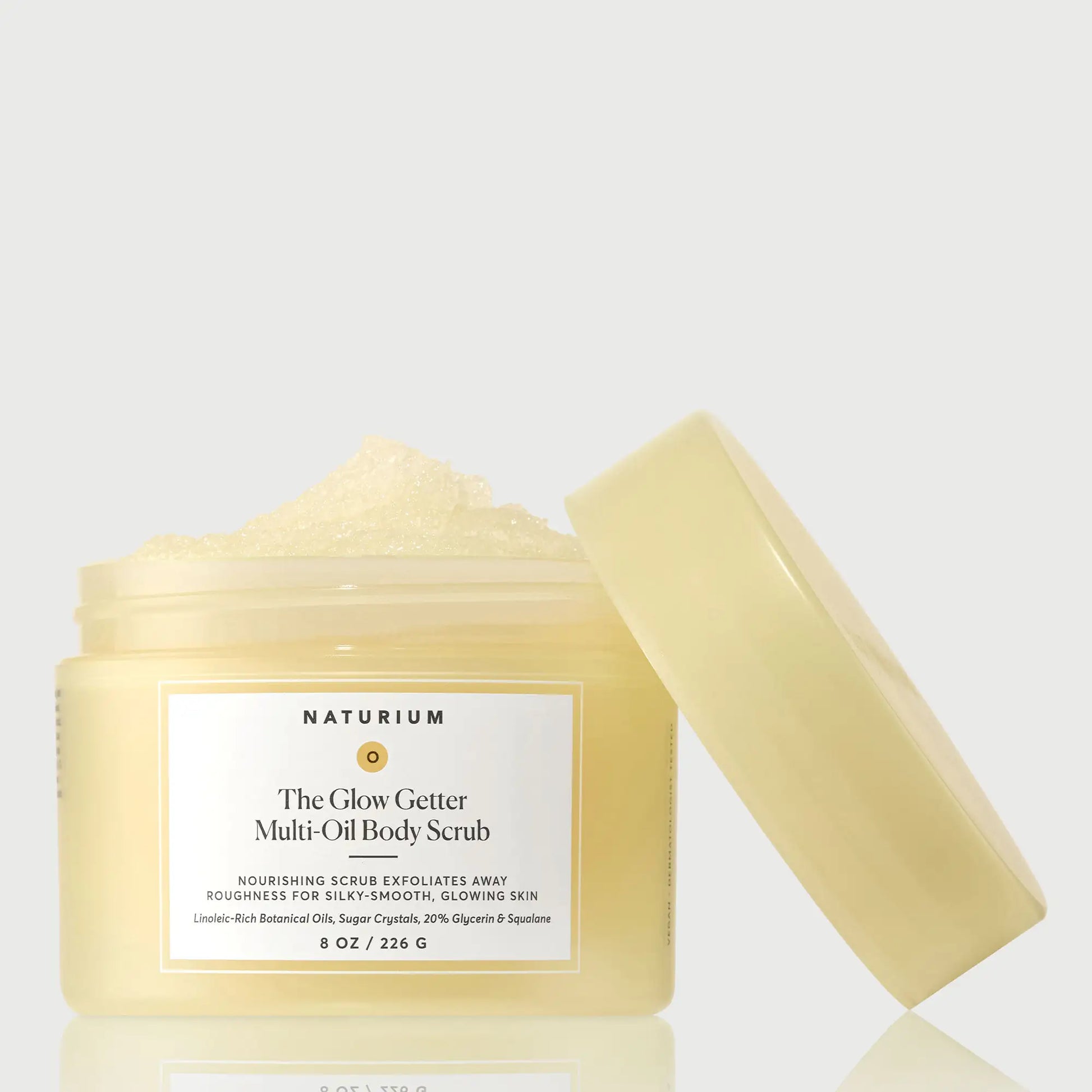 the-glow-getter-multi-oil-body-scrub-c8 NATR-40028-GlowGetter-Multi-Oil-Body-Scrub-Front-CapOff-bonebkgd.webp